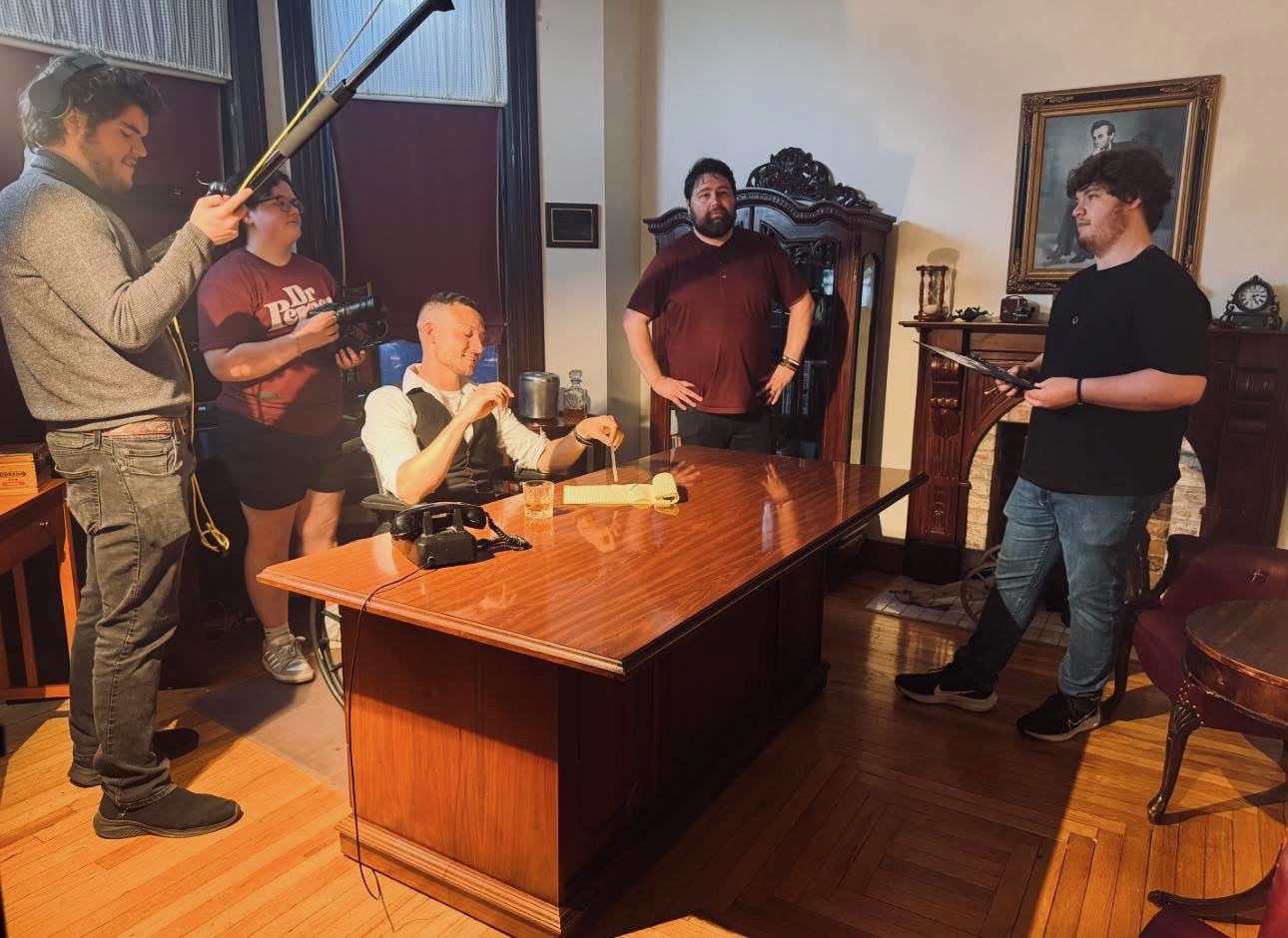 77 — behind the scenes on the Victorian study set, full crew at work